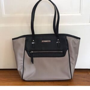 Nine west shoulder bag beige & black in color
